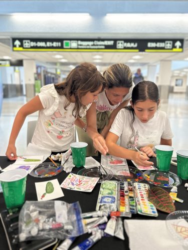 Pop-up artist demos create layovers for art lovers at Miami Airport
